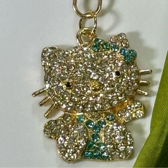 BAG CHARM Hello Kitty Gold Tone Blue Crystal Hair Bow Bag Charm Keychain - Picture 2 of 7